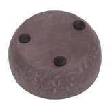 Underside view of the Libra Interiors Hammered Stonewash Decorative Bowl in brown aluminium, showing three black felt pads on a plain background.