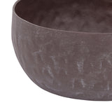 Libra Interiors Hammered Stonewash decorative bowl in brown aluminium with a matt raw stone wash finish, shown close-up to highlight its rounded profile.