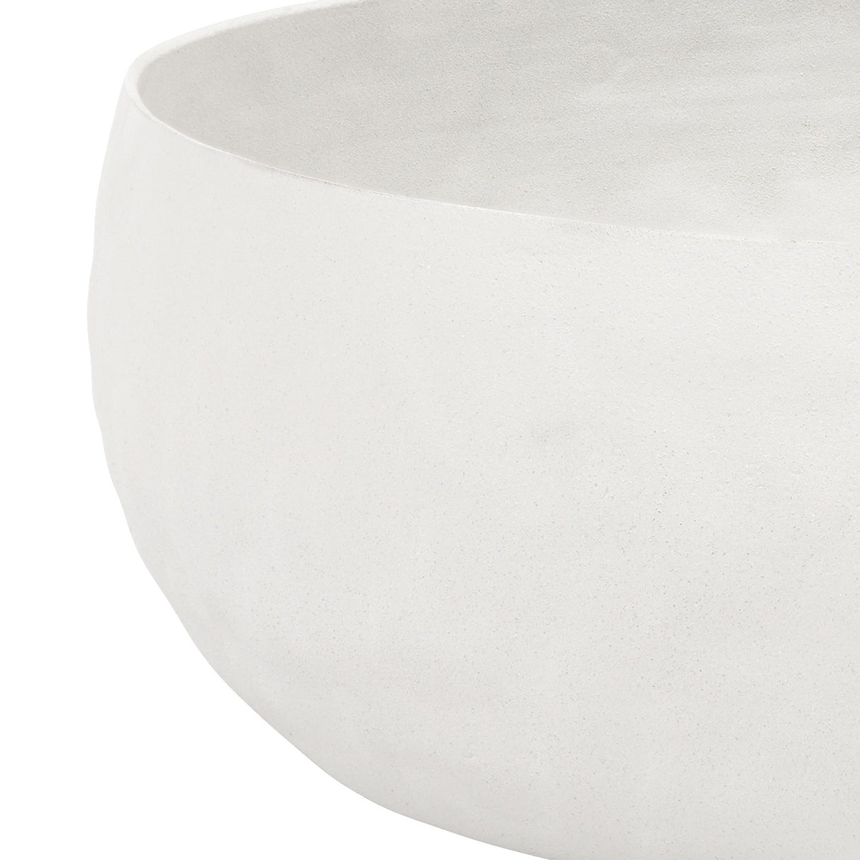 Close-up of Libra Interiors Hammered Stonewash Aluminium Bowl in white, showing the rounded form and matt stonewash finish against a plain background.