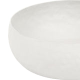 Close-up of Libra Interiors Hammered Stonewash Aluminium Bowl in white, showing the rounded form and matt textured finish against a plain background.