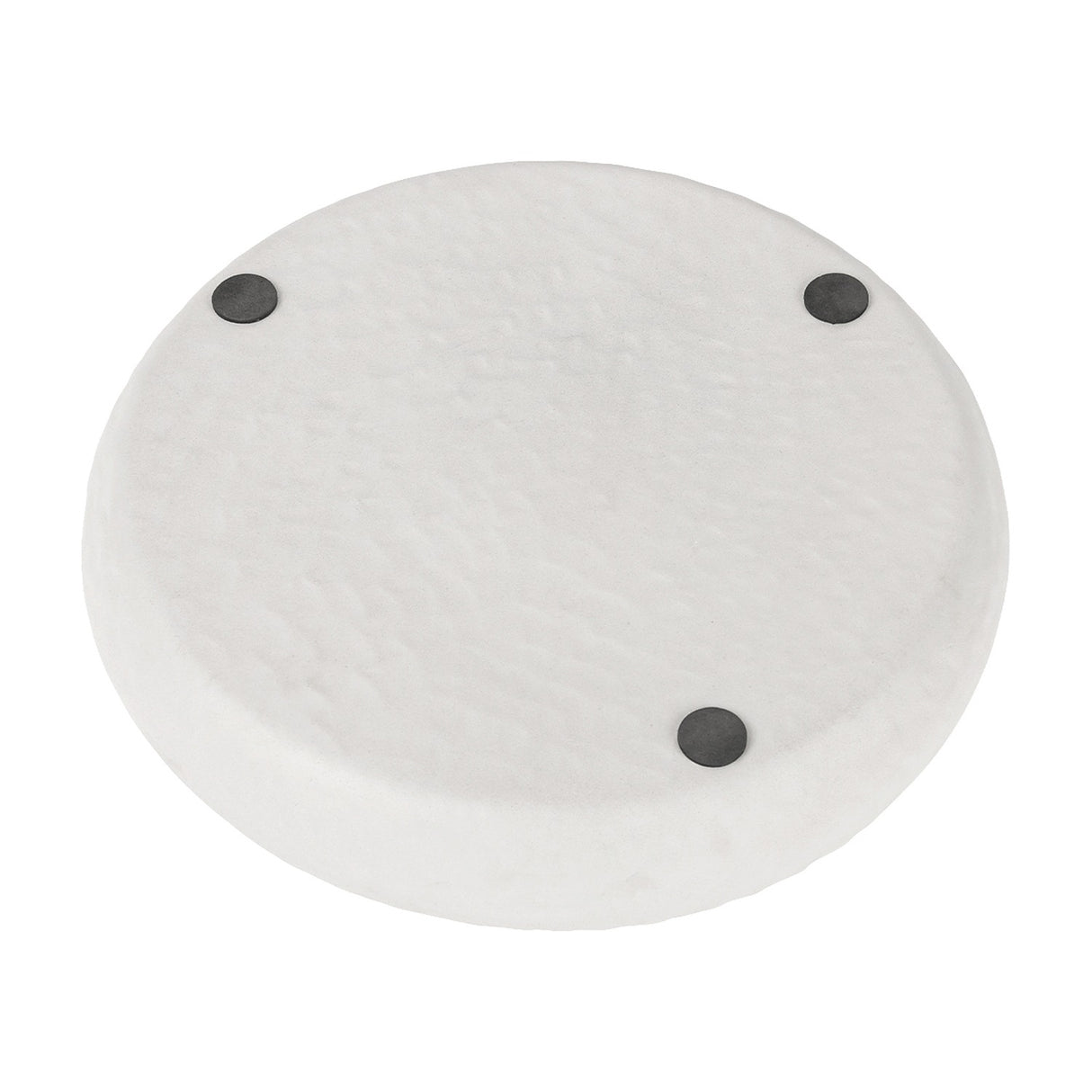 Libra Interiors Stonewash Hammered Round Bowl in white aluminium, underside view showing three small black feet and matt hammered finish on a white background.
