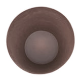 Top-down view into Libra Interiors Hammered Stonewash Aluminium Tapered Planter in brown, showing the mottled interior and rounded base.