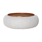 Libra Interiors Chenille Round Storage Ottoman in cream with a tactile boucle-style body and inset walnut-toned wooden tray, on a plain background.
