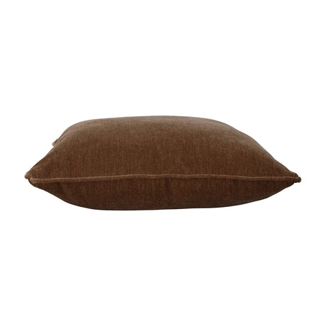 Libra Interiors Piped Plush Velvet Cushion in brown, shown side-on to reveal the square plush profile and corded piping along the seam, on a white background.