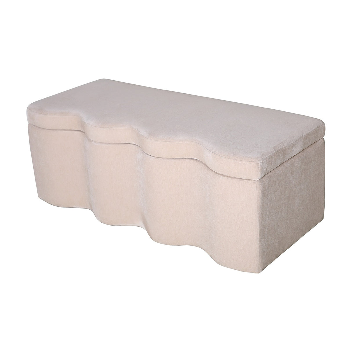 Libra Interiors Velvet Lift-Top Storage Ottoman in cream with a softly sculpted wave-front profile and smooth padded top, shown on a plain white background.
