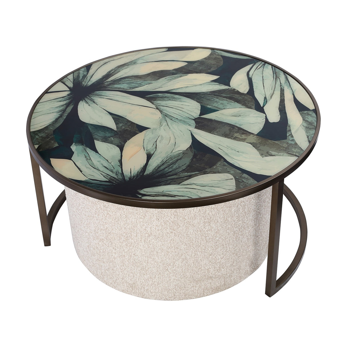 Libra Interiors Printed Glass Nesting Coffee Table in black with round green leaf-print top, bronze-tone iron frame and oatmeal fabric pouffe tucked beneath.