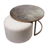 Libra Interiors Round Map-Print Glass Nesting Coffee Table with brass-toned iron frame and neutral cobble-weave fabric pouffe tucked beneath.