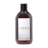 Libra Interiors Palo Santo 500ml reed diffuser refill in an amber-brown glass bottle with black screw cap and white label, on a plain background.