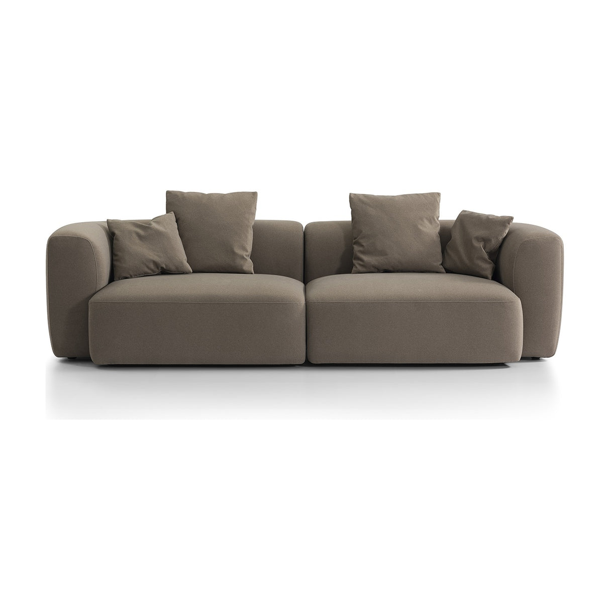 Libra Interiors Velvet Curved 2-Seater Modular Sofa in truffle beige, with rounded arms, deep seats and loose scatter cushions, on a plain white background.