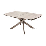 Libra Interiors Extendable Ceramic Stone-Effect Dining Table in warm stone with matt ceramic top and brushed grey angular intersecting metal base.