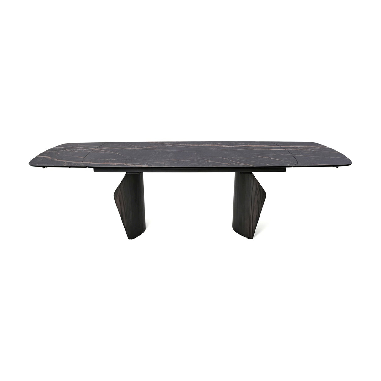 Libra Interiors extendable dining table with a charcoal ceramic stone-effect top, bronze veining, and dark wood-effect pedestal legs on a white background.