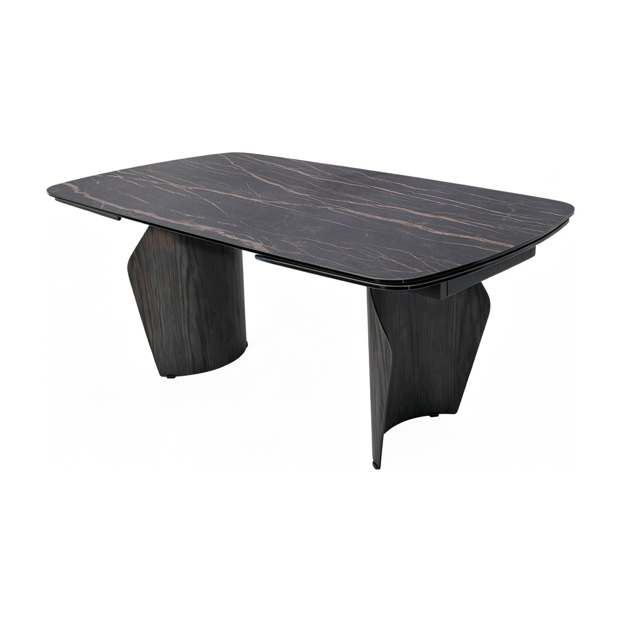 Libra Interiors extendable dining table with a charcoal ceramic stone-effect top featuring bronze veining, set on curved dark wood-effect pedestal legs.