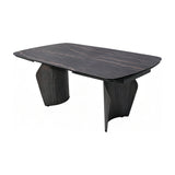 Libra Interiors extendable dining table with a charcoal ceramic stone-effect top featuring bronze veining, set on curved dark wood-effect pedestal legs.