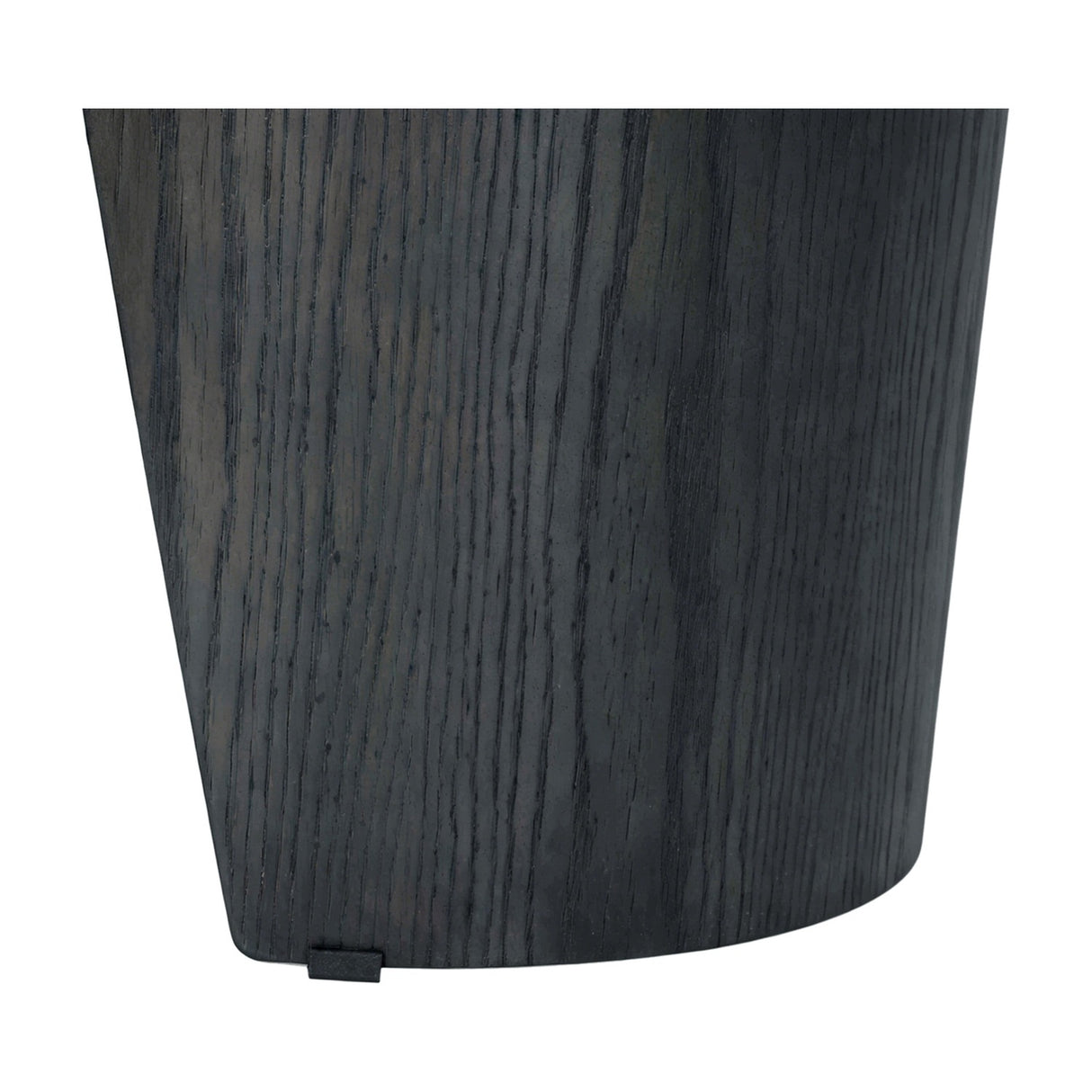 Close-up of the Libra Interiors extendable dining table base, showing the curved pedestal leg in a dark wood-effect finish with visible grain.