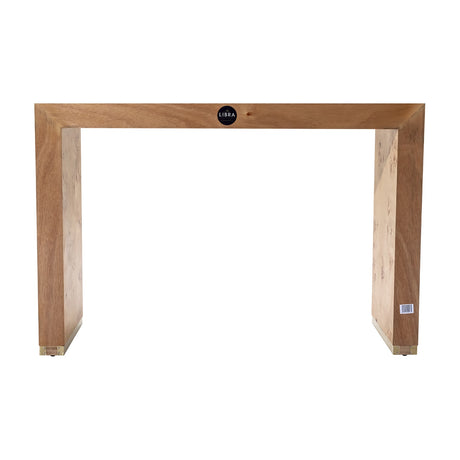 Libra Interiors Burlwood Brass-Detail console table in brown with waterfall silhouette, figured wood grain and brass corner feet, on a plain background.