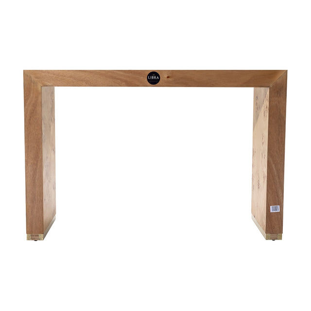 Libra Interiors Burlwood Brass-Detail console table in brown with waterfall silhouette, figured wood grain and brass corner feet, on a plain background.
