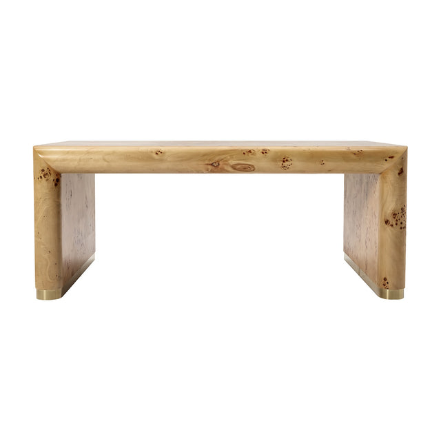 Libra Interiors Burlwood Waterfall coffee table in brown, rectangular with rounded waterfall edges, figured grain and brass toe caps, on a white background.
