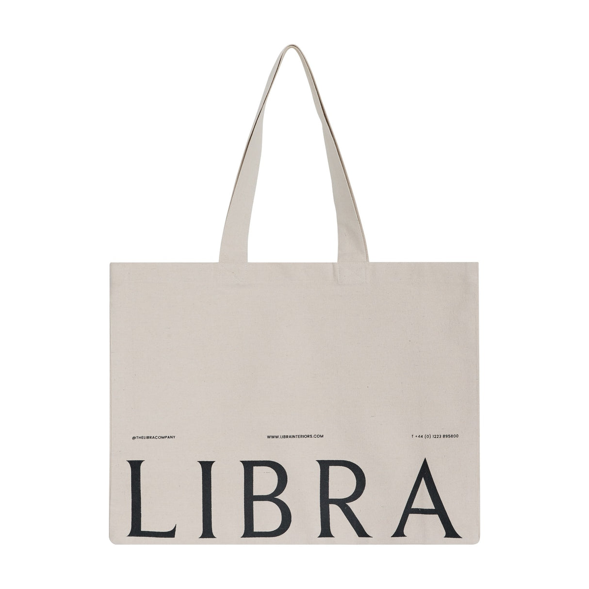 Libra Interiors natural cotton tote bag with long shoulder handles and black LIBRA lettering printed across the front, shown on a plain white background.