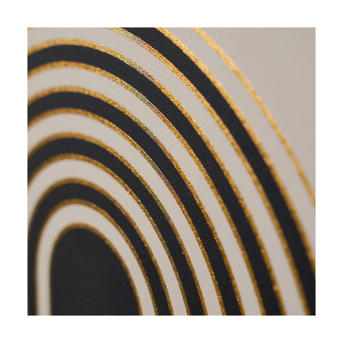 Close-up of an Art Deco wall art print, 60 x 80cm, showing concentric black and gold arched stripes on a canvas surface.
