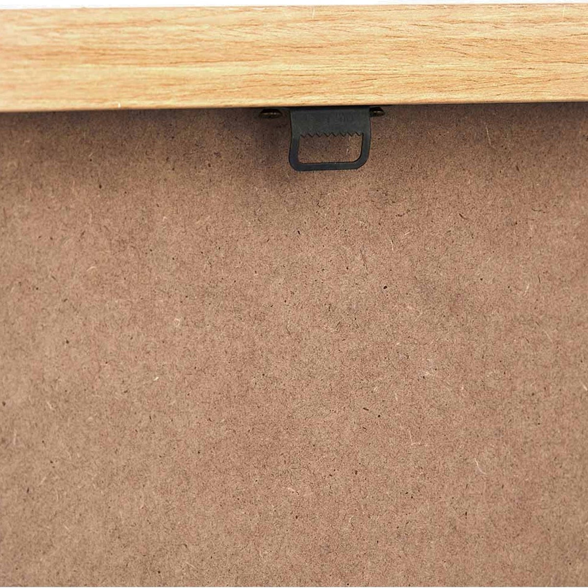 Close-up of the canvas wall art's reverse side, showing a natural wood frame edge, black sawtooth hanger, and MDF backing board.