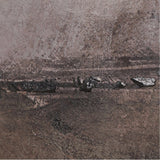 Close-up of a grey and neutral abstract landscape canvas from the set, showing textured black brushstrokes across a muted taupe-grey painted surface.