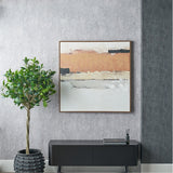 White & Terracotta Abstract Square Canvas in an oak effect frame, hung above a black sideboard with a potted plant beside it against a textured grey wall.