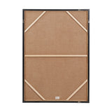 Reverse side of the Monochrome Abstract Canvas with Black Frame, showing wooden stretcher bars, brown backing paper, cross braces, and hanging hardware.