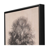 Framed canvas wall art with a black palm tree print on natural background, shown at an angle to display the black frame edge, on a plain white background.