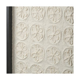 Close-up of Natural Paper Design Wall Art with a black frame, showing raised floral motifs in a repeating grid on textured white handmade paper.