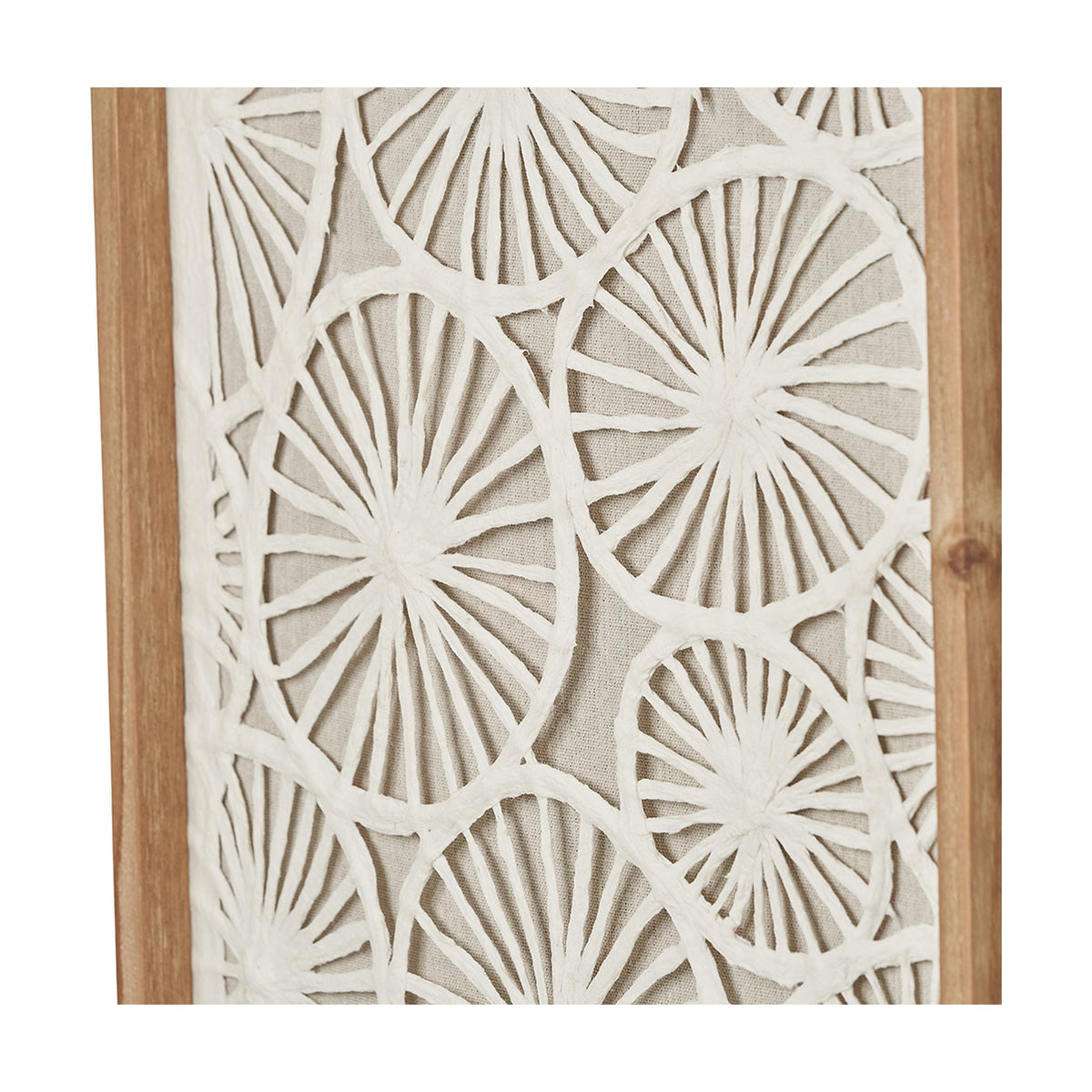 Close-up of wall art from a set of 2, showing a cut-out circular pattern in white paper over natural fabric, set within a wooden frame.