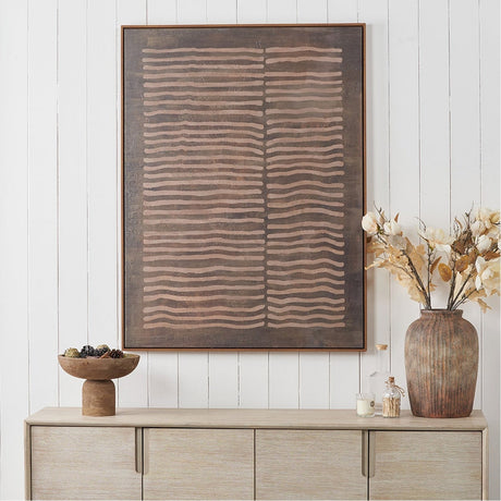 Brown & Natural Linear Design Canvas with oak effect frame, horizontal wavy stripe pattern, shown above a wooden sideboard with a vase and decorative bowl.