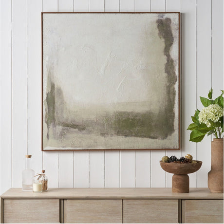 Square abstract hessian canvas wall art in green and natural tones with an oak effect frame, displayed above a wooden sideboard.