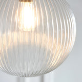 Endon Ashmere pendant light close-up showing the ribbed clear round glass shade illuminated by a warm E27 bulb against a light background.