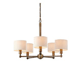 Endon Brenwood 5 light pendant with natural linen effect drum shades on hammered bronze arms, suspended from a chain on a plain white background.