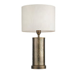 Endon Brenwood table lamp with a hammered aged bronze cylindrical steel base and natural linen-effect drum shade, shown on a plain white background.
