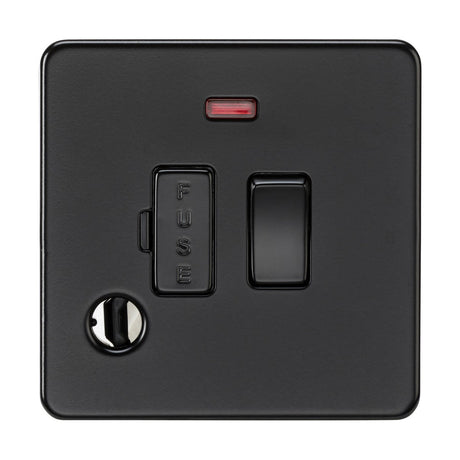 The 13A Switched Fused Spur Neon and Flex Outlet in matt black features a toggle switch with a top red indicator light, a sleek screwless design, and a round opening on the left for mounting or grounding screws.