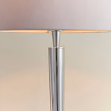 Close-up of Endon Crandale USB table lamp showing the slim bright nickel steel column and the lower edge of the mink faux silk shade.