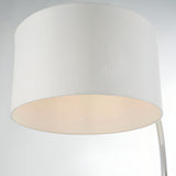 Close-up of the Brockfield Floor Lamp's large drum shade in white faux silk with a polished nickel arm visible, on a plain light background.