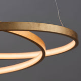 Endon Cliffley close-up detail of integrated LED ring pendant with warm gold leaf finish on slim metal hoop against a grey background.