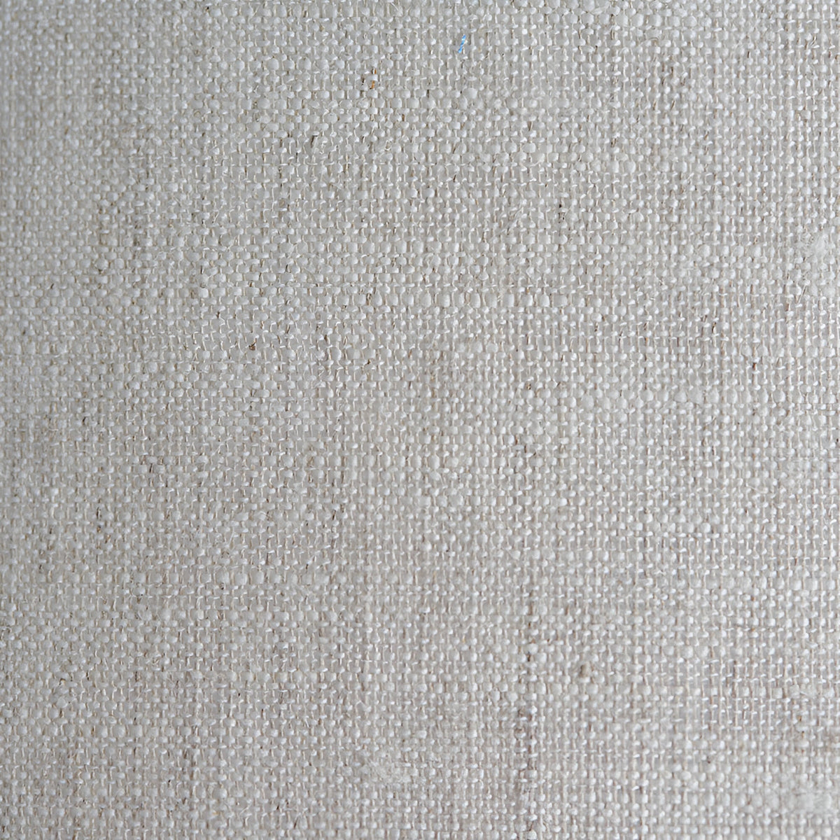 Close-up of the natural linen fabric shade on the Brendon Table Lamp, showing its woven texture and neutral tone.