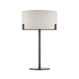 Brendon Table Lamp in bronze finish with a natural linen drum shade on a slim metal stem and round base, shown on a plain white background.
