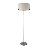 Endon Brendon floor lamp with slim brushed bronze metalwork, round base and natural linen drum shade, shown on a plain white background.