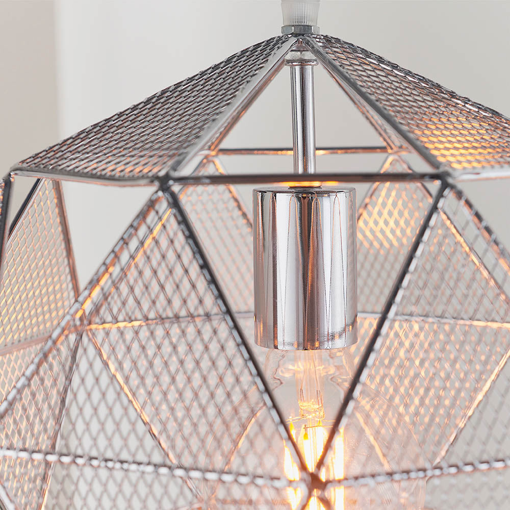 Aldford Pendant in polished chrome, close-up of geometric mesh triangle shade with E27 bulb visible, industrial style.