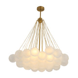 The Orb 37 Light Cluster Suspension - Gold is a modern chandelier with multiple frosted glass globes connected by gold rods, creating a striking cloud-like effect.