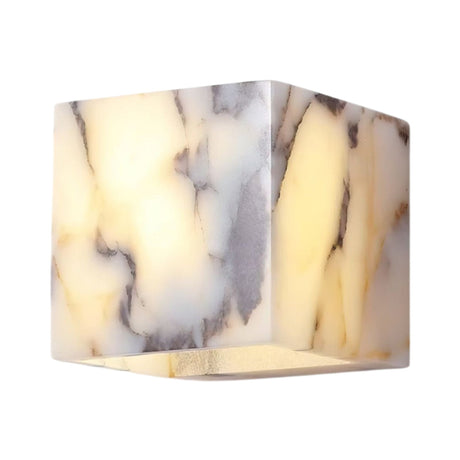 The Alvara 1 Light Cube Veined Marble Wall Light in white and black features a modern cube design with marble veining, providing a soft, warm glow—ideal for adding elegant, natural stone-inspired lighting to your space.