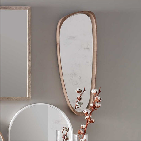 Wood veneer teardrop-shaped wall mirror, 33 x 90cm, with a natural finish frame, shown mounted on a grey wall beside a round mirror and cotton stems.