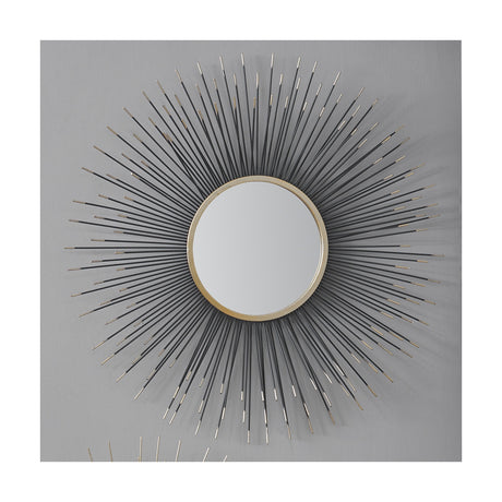 Round wall mirror, 80 x 80cm, with gold frame and black metal starburst rays extending outward, mounted on a light grey wall.