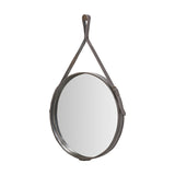 Round wall mirror in a peppercorn leather frame with matching leather hanging strap and buckle detail, shown on a plain white background.
