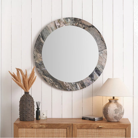 Myana Jade Marble Effect Veneer Round Wall Mirror, 80 x 80cm, with a grey-toned marble border, shown above a wooden sideboard in a hallway setting.