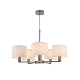 Endon Bexley 5 light pendant in bronze with five marble-effect faux silk drum shades on curved arms and adjustable drop rod, on white background.